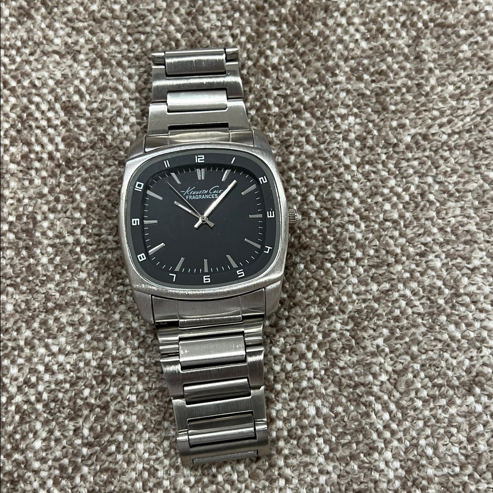 Kenneth Cole Fragrance watch. Unworn. Need battery.